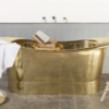 Vintage bathtub in polished brass