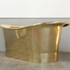 polished brass bathtub