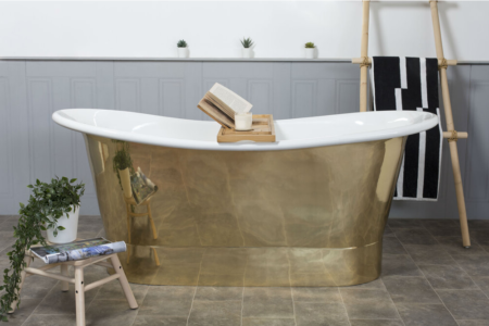 brass bathtub with ceramic interior