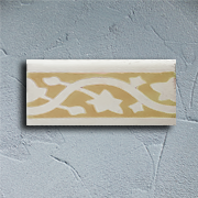 Yellow floral encaustic tile skirting board