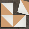 Baldosa hidráulica naranja geométrica de Crafted Tiles